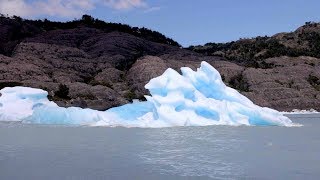 Iceberg Flips Over Revealing Glowing Flank