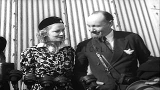 Sir Hubert and Lady Wilkins are interviewed upon arrival in the U.S. aboard the G...HD Stock Footage