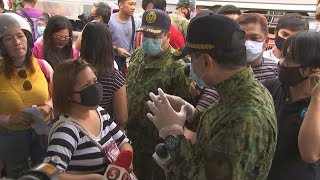 Authorities strictly inspect travelers at checkpoints