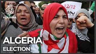 Algeria presses ahead with election amid protests