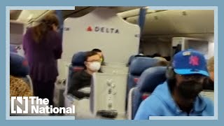 Passengers cheer as flight attendant announces end of mask mandate