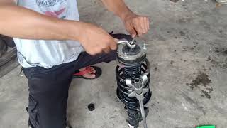 Cara mudah memasang shock absorber depan masda 2