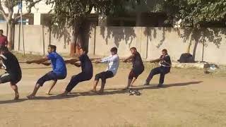 Raksha shakti university. Rassha khech  (tug of war)