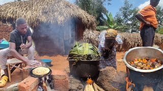 African village life of our organic young single mother harvesting and preparing banana.