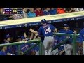 Travis d'Arnaud releases a WILD bat flip after a bases-loaded walk