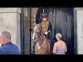 Girl Tries To Make The Queens Guard Laugh