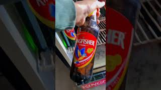 The image shows bottles of Kingfisher Strong beer, a popular Indian lager. Key details about