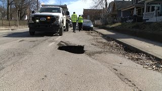 Large hole closes Michigan Street in Indianapolis