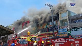 Firefighters battle blazing fire at a shopping center in Laoag City, Ilocos Norte