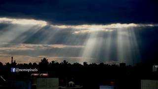 4K Timelapse - Sun Rays through Clouds