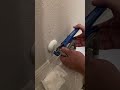 replacing a toilet shutoff valve.