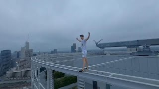 Climber scales London tower to highlight climate change