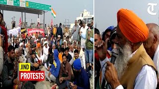 Farmer leader Gurnam Singh Chaduni meets agitationist during toll plaza blockade in Jind