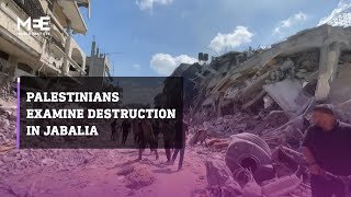 Displaced Palestinians return to examine destroyed homes and businesses in Jabalia