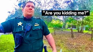 'Tough Guy' Rolls Up Window On Cop's Arm, Gets Humbled