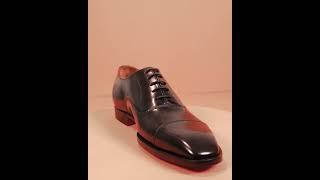 Black Cap Toe Oxford shoes.