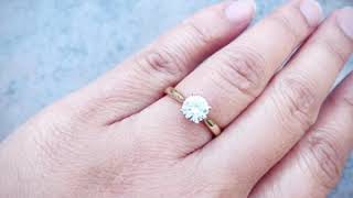 6.5mm Round Forever One Charles and Colvard Moissanite 14k Yellow Gold Solitaire Tapered Ring 1 ct