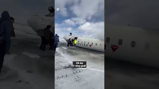 Passengers and crew evacuate overturned Delta plane after crash