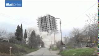 Failed demolition explosion leaves building tilted to one side