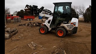 L 28 Bobcat with new grapple bucket