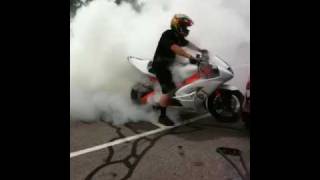 Motorcycle burnout- stunt seduction