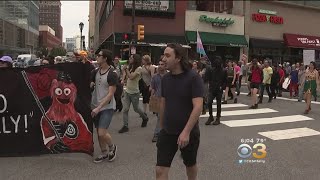 Demonstrators Use Flyers’ Mascot Gritty To Protest President Trump’s Philadelphia Appearance