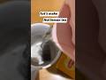 Mixing lemon tea powder with tea bag