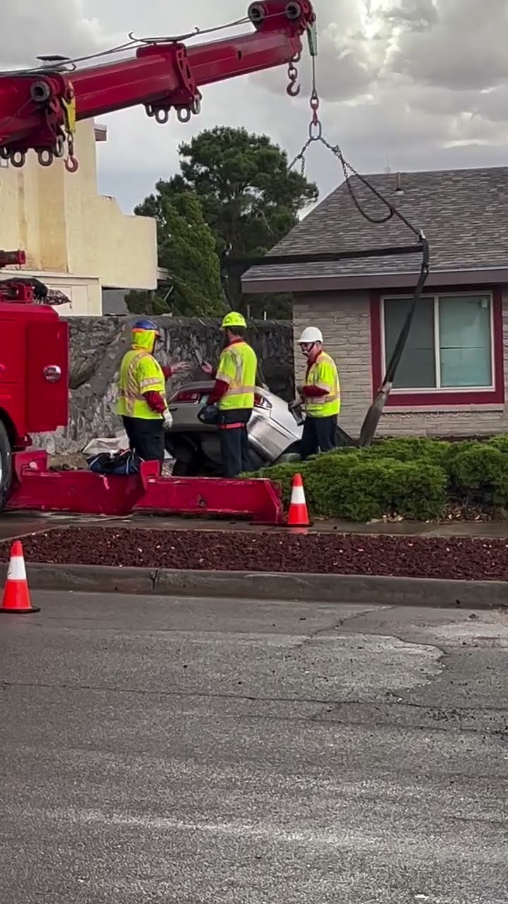 Crews Removing The Two Cars That Fell Into The Sinkhole In The Front ...