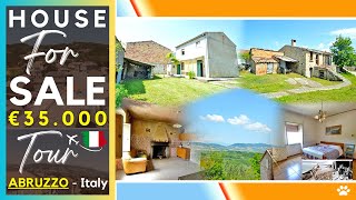 Rural Property with Flat Garden, Garage, Two Bedrooms, and Restoration Potential for Barn in Abruzzo