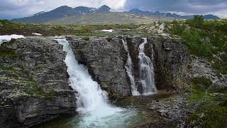 Storulfossen (Bruresløret) waterfalls at Rondane National Park Norway.