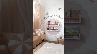 Reading nook for kids with Ponponi wall decals and wooden decor
