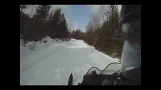 SnowStig riding Yamaha Apex on VAST Snowmobile Trail 106