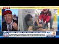 Mayoral Candidate Curtis Sliwa comforts Penn Station homeless man