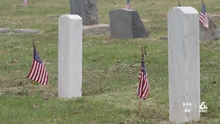 Veterans and local community place flags for Memorial Day at Arroyo Grande Cemetery