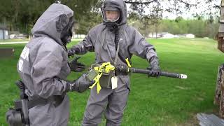 U.S. Army Reserve chemical reconnaissance team surveys site