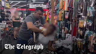 Peckham shop owner seen 'choking' woman accused of stealing