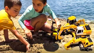 Playing with Construction Truck Toys at the Beach! | Toy Trucks for Kids | JackJackPlays