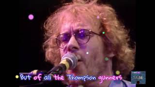 Warren Zevon live  "Roland The Headless Thompson Gunner"   with lyrics on screen.