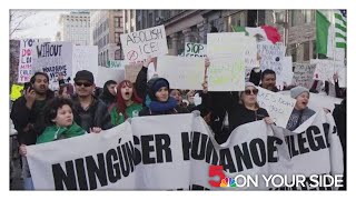 Hundreds march in downtown St. Louis, protesting Trump's immigration policies