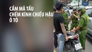 Lại cầm mã tấu chém gãy kính chiếu hậu ô tô trên đường phố Sài Gòn