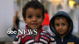 Germany Opens Its Doors to Over 20,000 Refugees