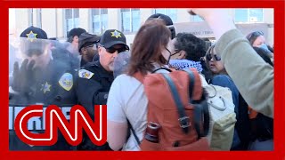 Police confront protesters at University of Wisconsin