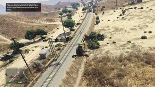 Grand Theft Auto V - trolling friend with attack chopper on train tracks