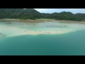 海を歩く人々 奄美大島 喜瀬のかくれ浜（ドローン空撮4k）