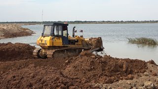 Powerful Dump Truck and Bulldozer at Work - Best Heavy Equipment Dozer Pushing Dirt Filling Lake