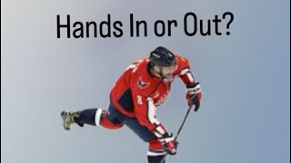 Hands in or out? (hockey shot)