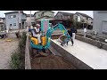 working car mini excavator backfill construction site in japan