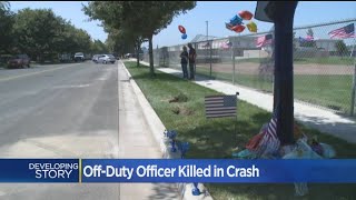People Pay Respects To Off-Duty Officer Killed In Crash
