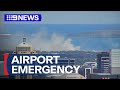 BREAKING: Reported engine explosion sparks fire at Sydney Airport | 9 News Australia