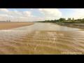 amazing drone footage flying along with the mersey river tidal bore